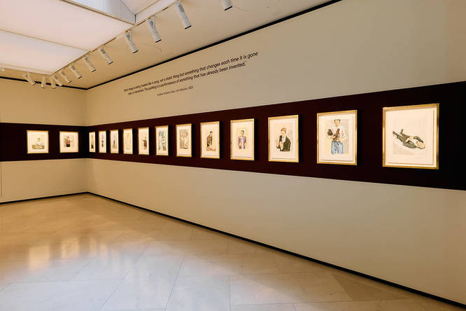 Bob Dylan Point Blank Exhibition in London with row of paintings by the singer