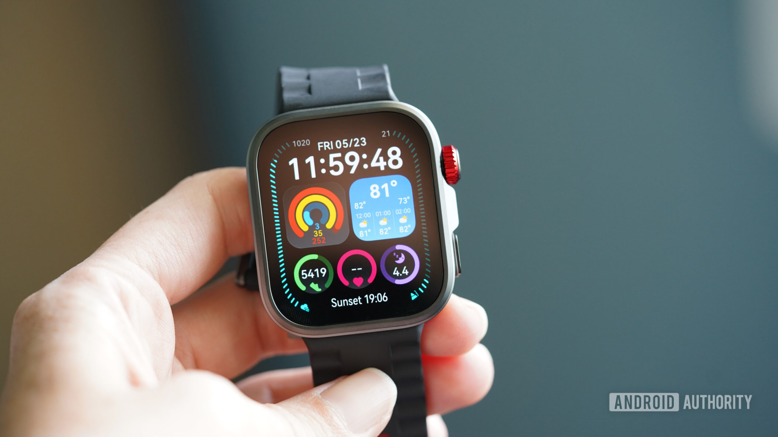 A Huawei Watch Fit 4 Pro in a user's hand displays the watch face.