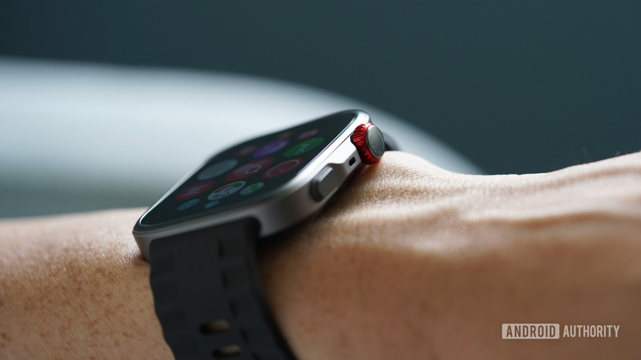 The Huawei Watch Fit 4 Pro features a prominent, red rotating crown.