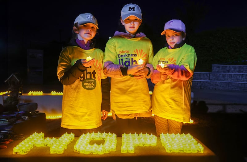 The annual Darkness into Light walk from Lámh Dhearg GAC in west Belfast, bringing together individuals, families, and communities to raise awareness and support for those affected by suicide and mental health issues. PICTURE: MAL MCCANN