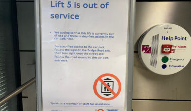 A Transport for London lift out of service sign.