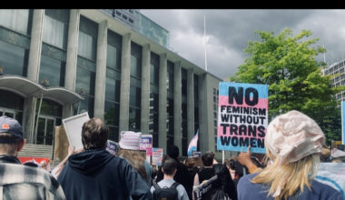 “Trans rights are human rights,” protesters chanted inside Manchester Victoria