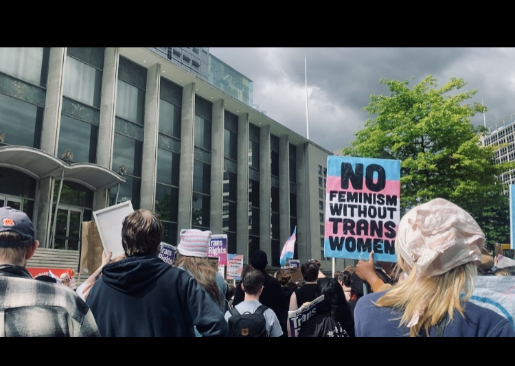 “Trans rights are human rights,” protesters chanted inside Manchester Victoria