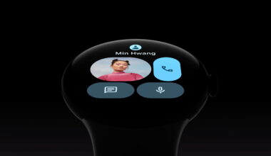 A Pixel Watch showing a redesigned Contacts tile with the contact's name and photo, with icons to call, message, or voice-to-text message her.