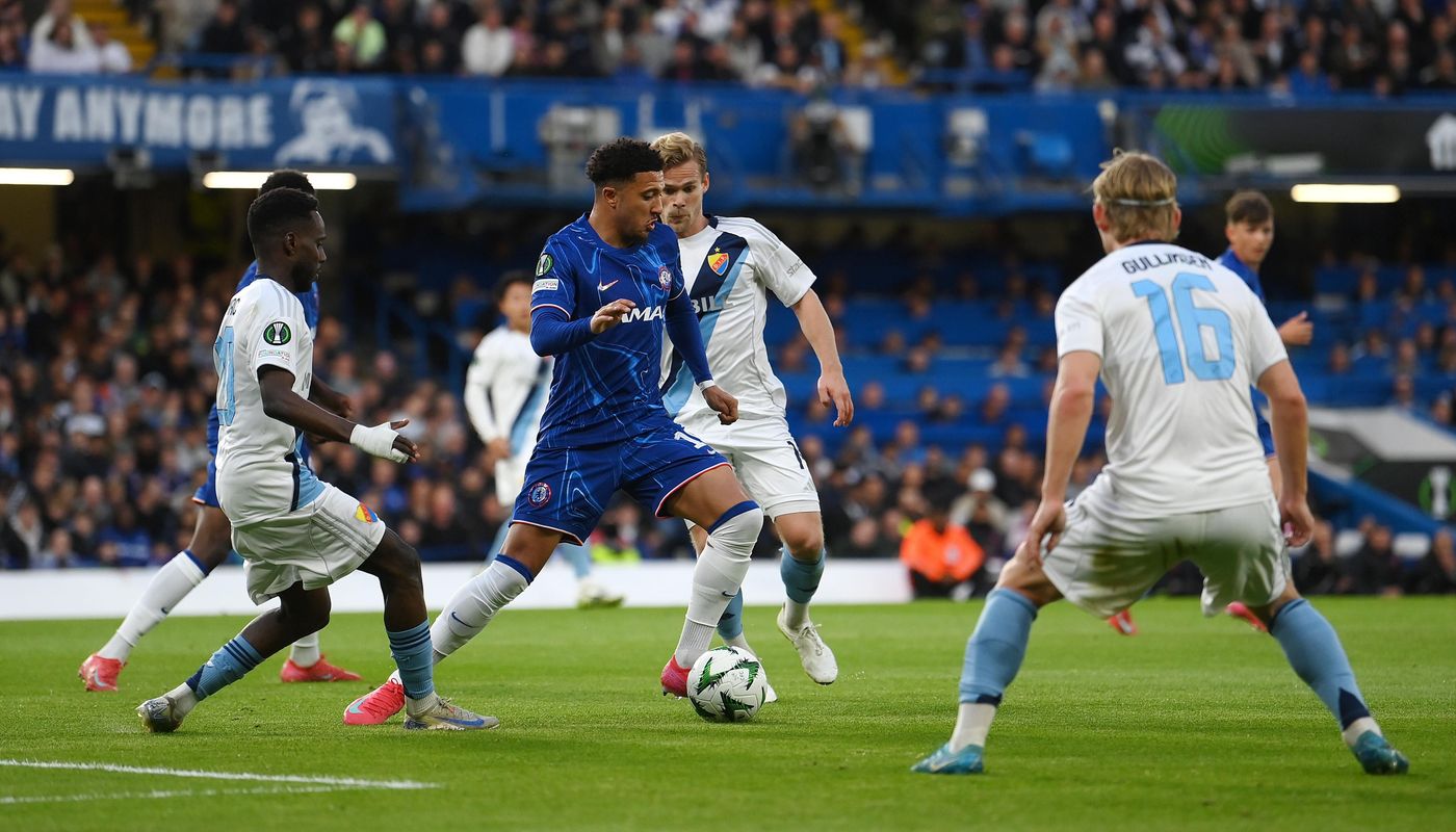 Jadon Sancho expertly shields the ball