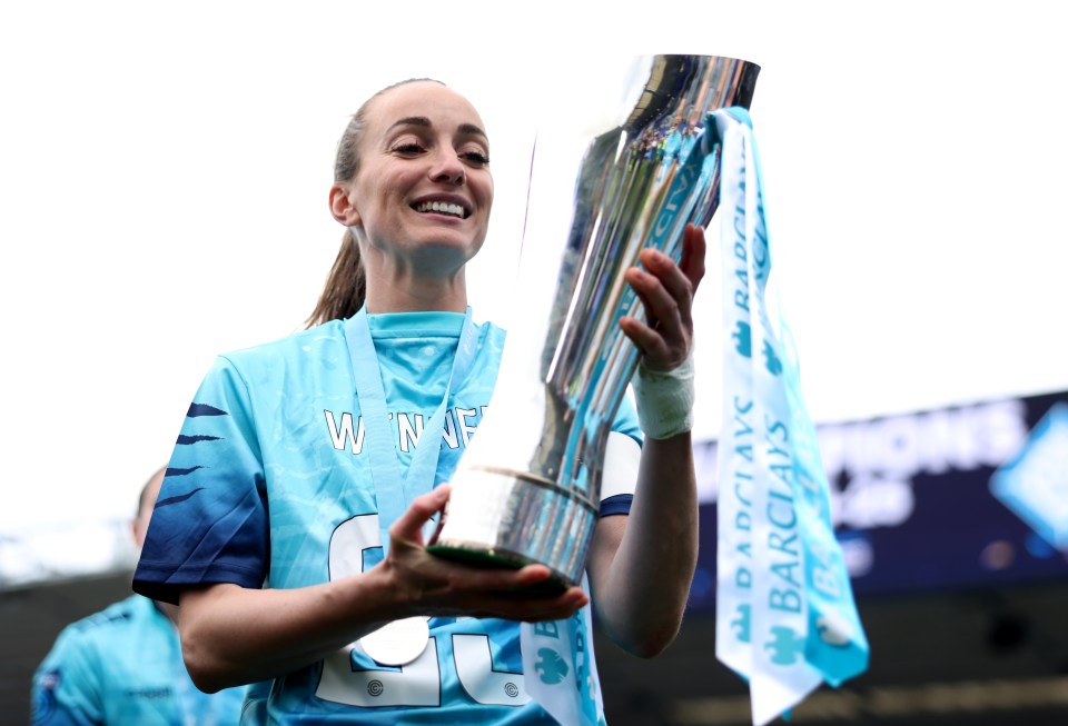 BIRMINGHAM, ENGLAND - MAY 04: Kosovare Asllani of London City Lionesses celebrates with the Barclays Women's Championship trophy after London City Lionesses win the Barclays Women's Championship and subsequently gain promotion to the Barclays Women's Super League after the Barclays Women's Championship match between Birmingham City and London City Lionesses at St Andrews at Knighthead Park on May 04, 2025 in Birmingham, England. (Photo by Matt Lewis - The FA/The FA via Getty Images)