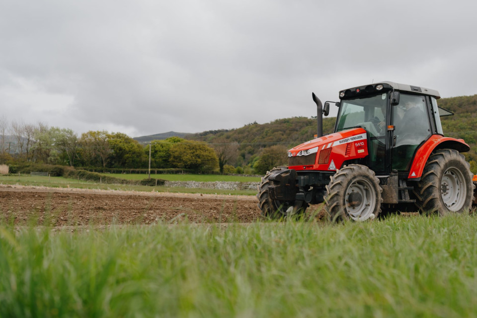 A red tractor in a field