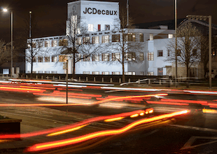 Long exposure showing car lights as lines outside the JC Decaux office