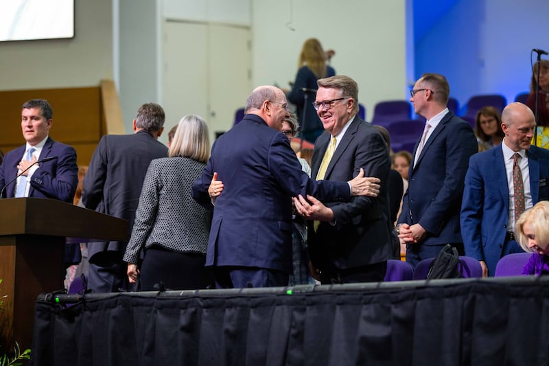 Elder Quentin L. Cook of the Quorum of the Twelve Apostles greets General Authority Seventy and Europe North Area president, Elder Scott D. Whiting, at a multi-stake conference held in Birmingham, England on Sunday, May 25, 2025.