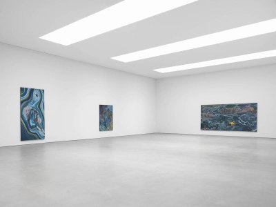 A gallery filled with paintings.