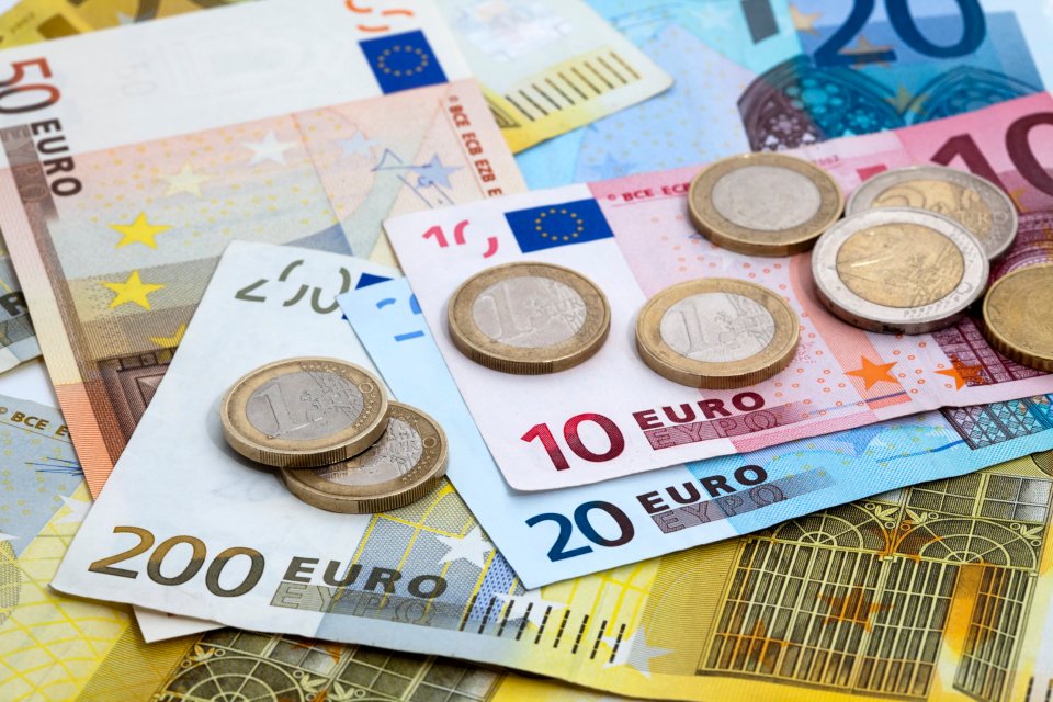 Euro banknotes and coins.