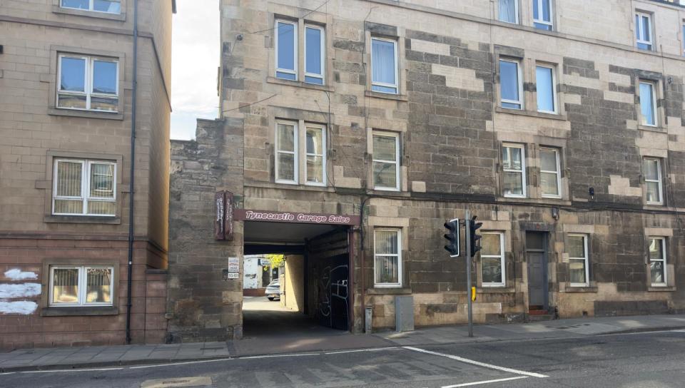 Tynecastle Garage Sales entrance in a stone building.