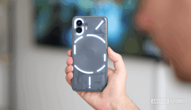 Nothing Phone 2 in gray with glyph lighting enabled