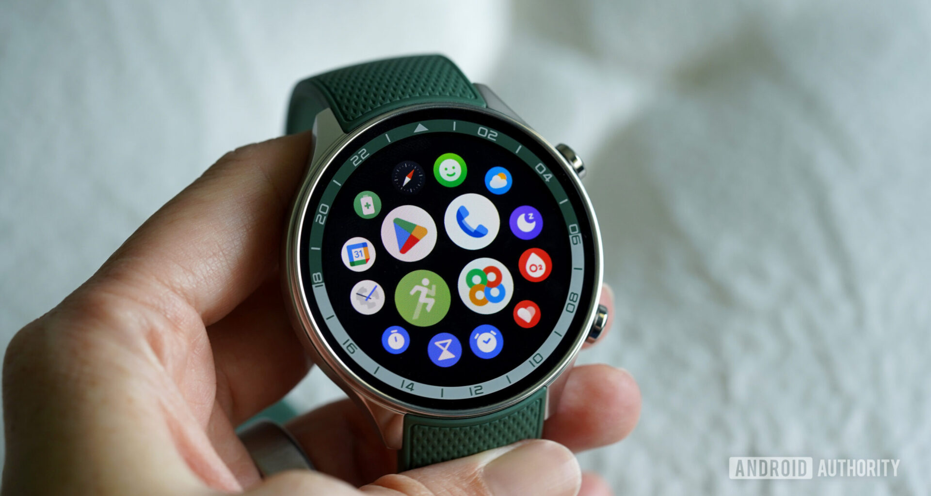 A OnePlus Watch 2R displays its app library.