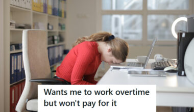 Woman stressed out with head on her desk