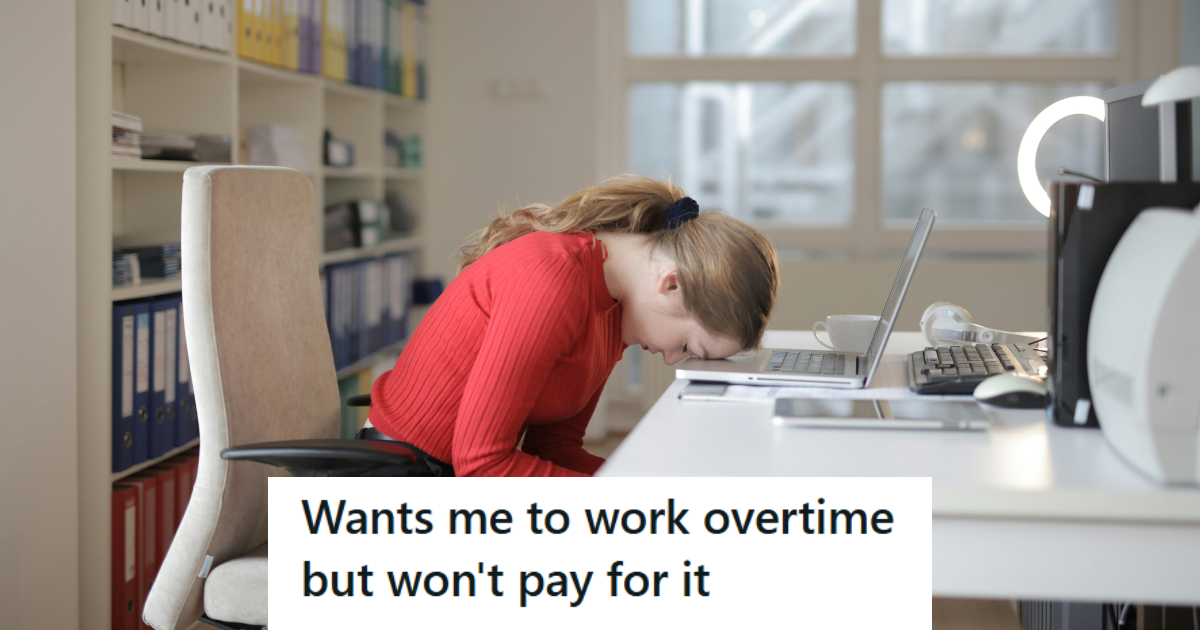 Woman stressed out with head on her desk