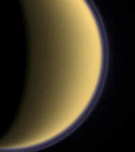 titan atmosphere mysterious gyroscopic motion