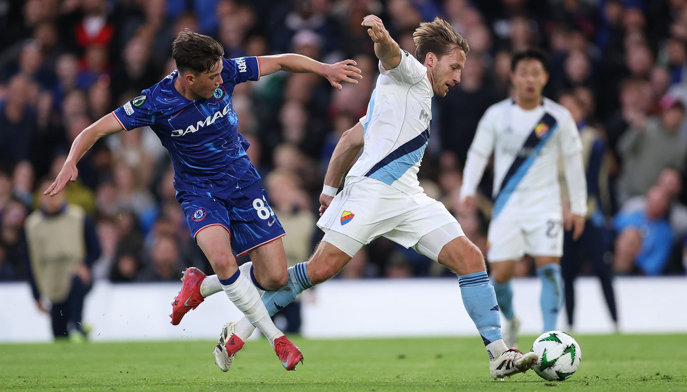 Reggie Walsh, left, makes history as the youngest Chelsea player to start a European match