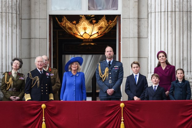 (From L to R) Britain's Princess Anne, Princess Royal, Britain's Prince Edward, Duke of Kent, Britain's King Charles III, Britain's Queen Camilla, Britain's Prince William, Prince of Wales, Britain's Prince George of Wales, Britain's Prince Louis of Wales, Britain's Catherine, Princess of Wales and Britain's Princess Charlotte of Wales watch the flypast over Buckingham Palace after attending the armed forces procession on May 5, 2025 to celebrate the 80th anniversary of VE Day also known as Victory in Europe Day, marking the end of the Second World War in Europe. (Photo by Adrian DENNIS / AFP) (Photo by ADRIAN DENNIS/AFP via Getty Images)