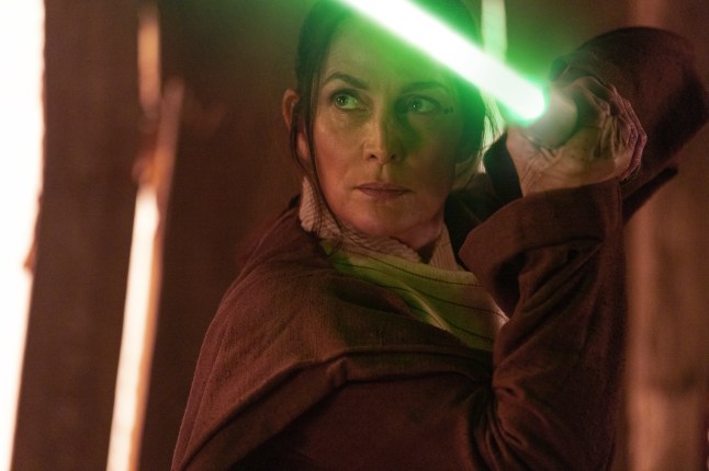 Jedi Master??Indara??(Carrie-Anne Moss) in Lucasfilm's THE ACOLYTE, exclusively on Disney+. ??2024 Lucasfilm Ltd. & TM. All Rights Reserved.