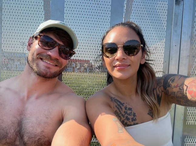 PIC FROM Kennedy News and Media (PICTURED: ISABEL COLES, 32, WITH HUSBAND, CHRISTOPHER COLES, 28, DURING HONEYMOON) A bride was devastated when her new hubby killed himself the DAY AFTER their 'perfect' honeymoon - before sending her flowers from beyond the grave. Isabel Coles married her husband Christopher Coles in September 2024 after meeting on a dating app a year and a half before and were 'insanely happy'. The newlyweds chose to go to a beach-front music festival at the iconic Asbury Park in New Jersey, US, for their honeymoon as music was a big part of their relationship. DISCLAIMER: While Kennedy News and Media uses its best endeavours to establish the copyright and authenticity of all pictures supplied, it accepts no liability for any damage, loss or legal action caused by the use of images supplied and the publication of images is solely at your discretion. SEE KENNEDY NEWS COPY - 0161 697 4266
