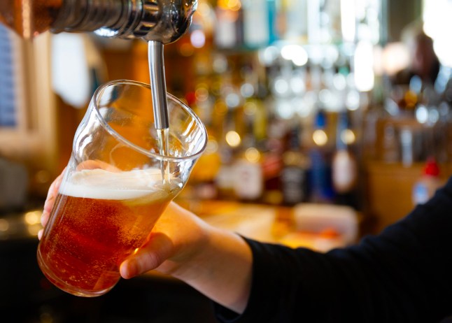 Australia Melbourne, a glass of beer being poured