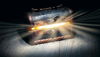 Glowing bright rays of light from an old, open wooden dark brown treasure chest, the concept of a surprise, gift, pandora