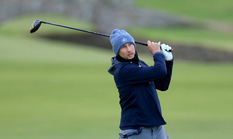 ST ANDREWS, SCOTLAND - SEPTEMBER 29: Joe Root of England the former England Test cricket captain and leading batsman plays his tee shot on the second hole on Day One of the Alfred Dunhill Links Championship on the Old Course St. Andrews on September 29, 2022 in St Andrews, Scotland. (Photo by David Cannon/Getty Images)