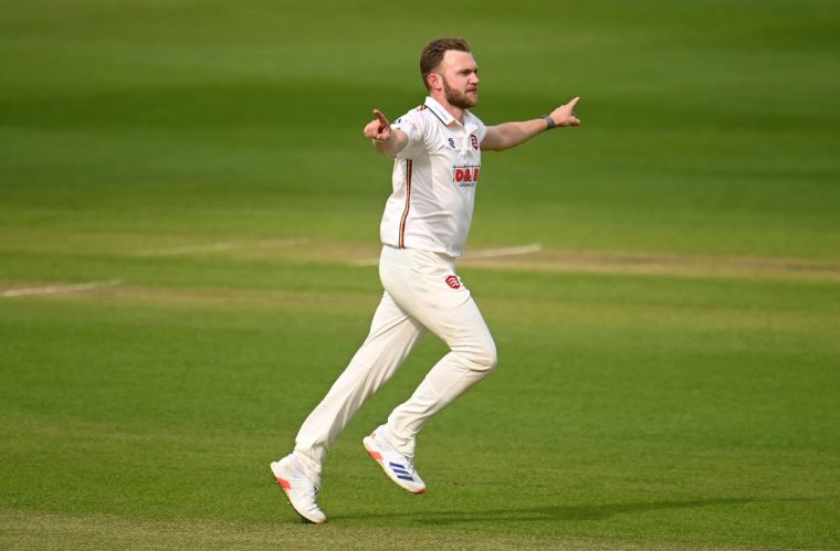 TAUNTON, ENGLAND - MAY 03: Sam Cook of Essex celebrates the wicket of Andrew Umeed of Somerset during Day One of the Vitality County Championship match between Somerset and Essex at The Cooper Associates County Ground on May 03, 2024 in Taunton, England. (Photo by Harry Trump/Getty Images)