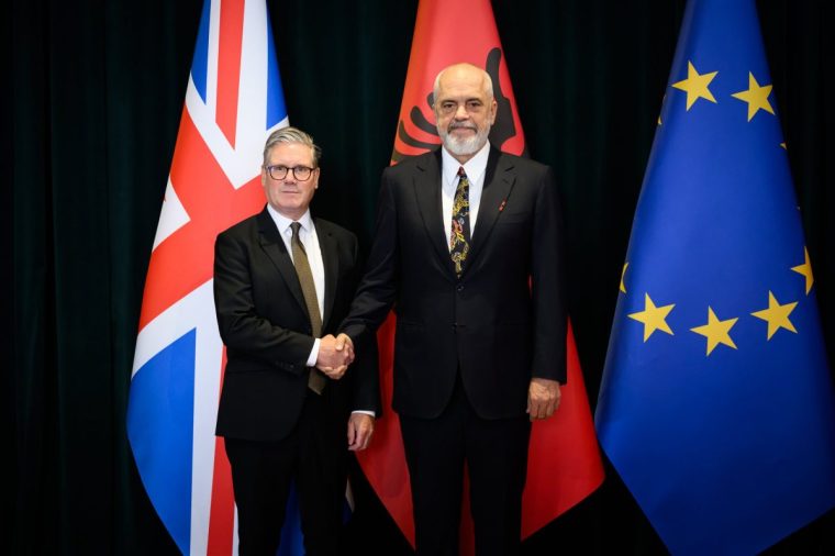 TIRANA, ALBANIA - MAY 15: Britain's Prime Minister Keir Starmer (L) is greeted by Albania's Prime Minister Edi Rama at the Kryeministria on May 15, 2025 in Tirana, Albania. Ahead of his attendance at the the European Political Community (EPC) Summit on Friday, Prime Minister Starmer's agenda in Albania is expected to coincide with an announcement of further measures the government is taking to target organized immigration crime. (Photo by Leon Neal/Getty Images)