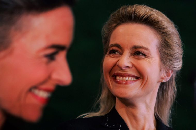 BERLIN - MARCH 19: German Family Minister and mother of seven children Ursula von der Leyen sits in front of a poster that shows a picture of herself during a presentation of her new co-written book "Wir muessen unser Land fuer die Frauen veraendern" ("We Must Change our Country for Women") March 19, 2007 in Berlin, Germany. Von der Leyen has been outspoken in creating more equal opportunities for women in Germany. (Photo by Sean Gallup/Getty Images)