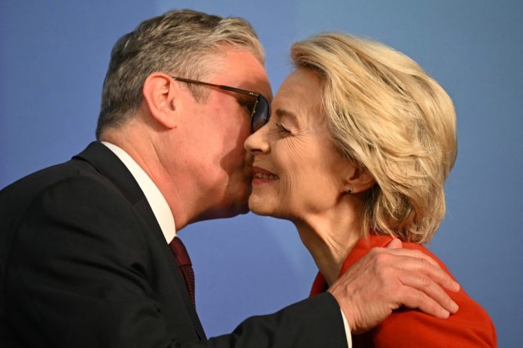 LONDON, ENGLAND - APRIL 24: UK Prime Minister Keir Starmer (L) greets European Commission President Ursula von der Leyen as he welcomes her to the stage to deliver a keynote speech during the Future of Energy Security Summit, hosted by the International Energy Agency and UK Government at Lancaster House April 24, 2025 in London, England. This Summit examines the geopolitical, technological and economic factors affecting energy security at a national and international level. (Photo by Justin Tallis - WPA Pool/Getty Images)