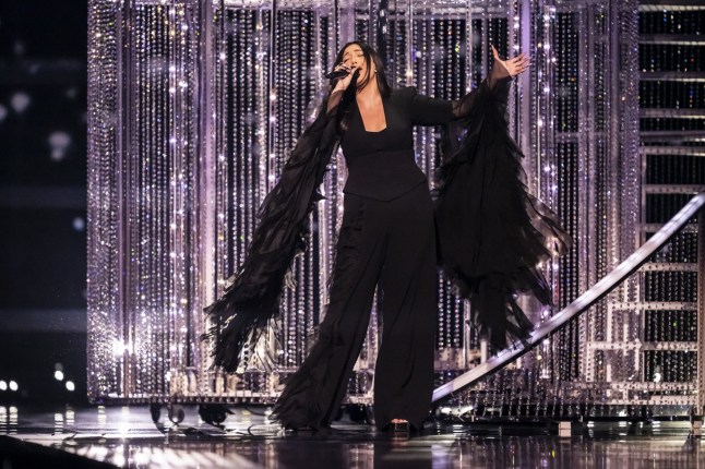 epa12110834 Israel's Yuval Raphael performs the song "New day will rise" during the grand final of the 69th Eurovision Song Contest (ESC) in Basel, Switzerland, 17 May 2025. EPA/GEORGIOS KEFALAS