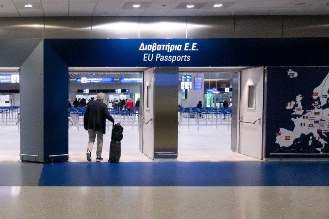 EU - Schengen Zone Countries and Non-EU countries Passport control at the Greek capital, Athens International Airport ATH LGAV in Greece, on July 28, 2020. There are gates with visible symbols, signs, flags and inscription of EU - Schengen zone countries. Greece lifted coronavirus Covid-19 pandemic travel ban restrictions gradually to jumpstart the tourism industry and summer season but with many testing units at the country's entry points and obligatory quarantine to passenger from high-risk countries. (Photo by Nicolas Economou/NurPhoto via Getty Images)
