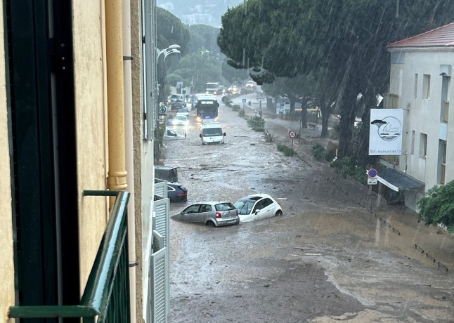 Cars submerged in floodwater in Le Lavandou.