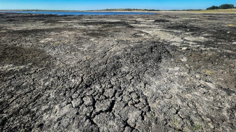 BODMIN, ENGLAND - AUGUST 12: Low water levels and the dried bed are seen at Colliford Lake near Bodmin on August 12, 2022 in Cornwall, United Kingdom. Water levels at Cornwall???s largest reservoir on Bodmin Moor are currently only 40% full - a low water level not seen since 1995 - revealing a forgotten landscape that has not been seen for decades. After a prolonged period of dry weather, some parts of the southern UK are facing drought conditions, prompting hosepipe bans and other water-conservation measures. (Photo by Matt Cardy/Getty Images)