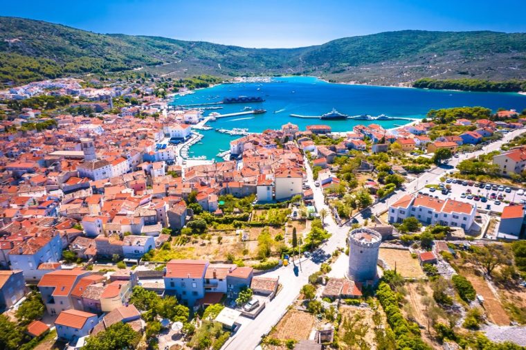 Adriatic town of Cres tower and bay aerial view, Kvarner archipelago of Croatia