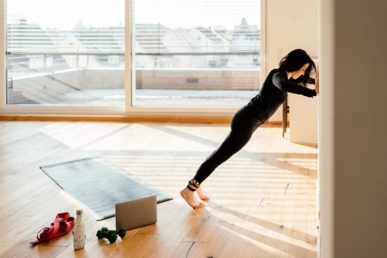 A woman working out at home