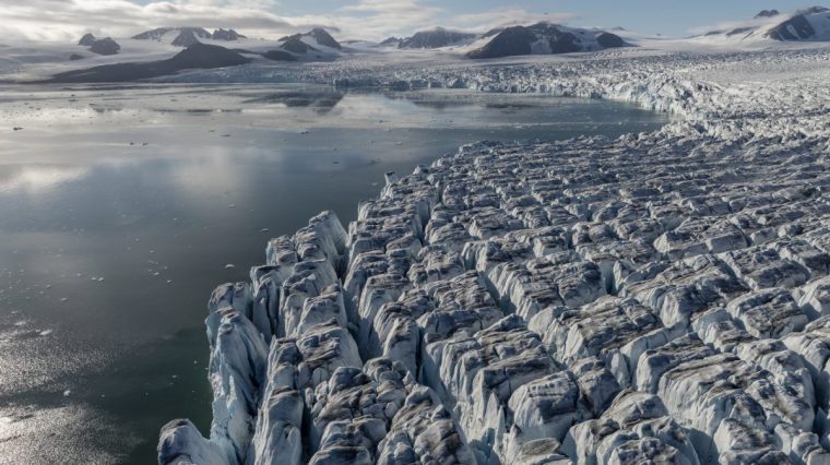 SVALBARD AND JAN MAYEN - JULY 18: A view of glaciers in Svalbard and Jan Mayen on July 18, 2024. The National Arctic Scientific Research Expedition team, organized for the fourth time this year in the Arctic Ocean, identified the decreasing sea ice due to global climate change through sampling, evaluation, observation, and unmanned aerial vehicles. In the studies conducted using remote sensing methods, an analysis of the average sea ice distribution for June 2023 and 2024 revealed a significant decrease in sea ice this year. (Photo by Sebnem Coskun/Anadolu via Getty Images)