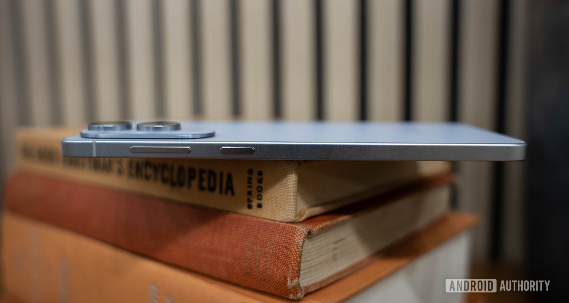 Samsung Galaxy S25 Edge Thickness Shown on top of Books