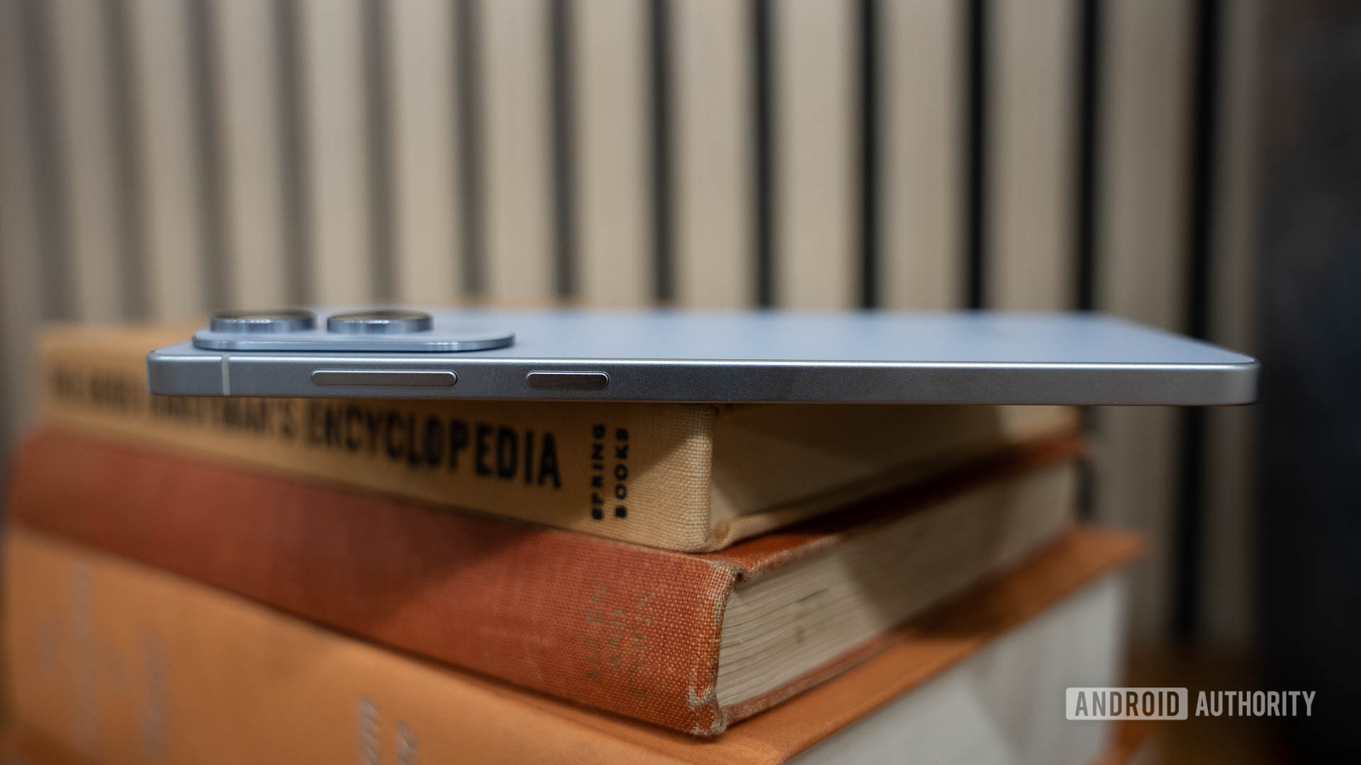Samsung Galaxy S25 Edge Thickness Shown on top of Books