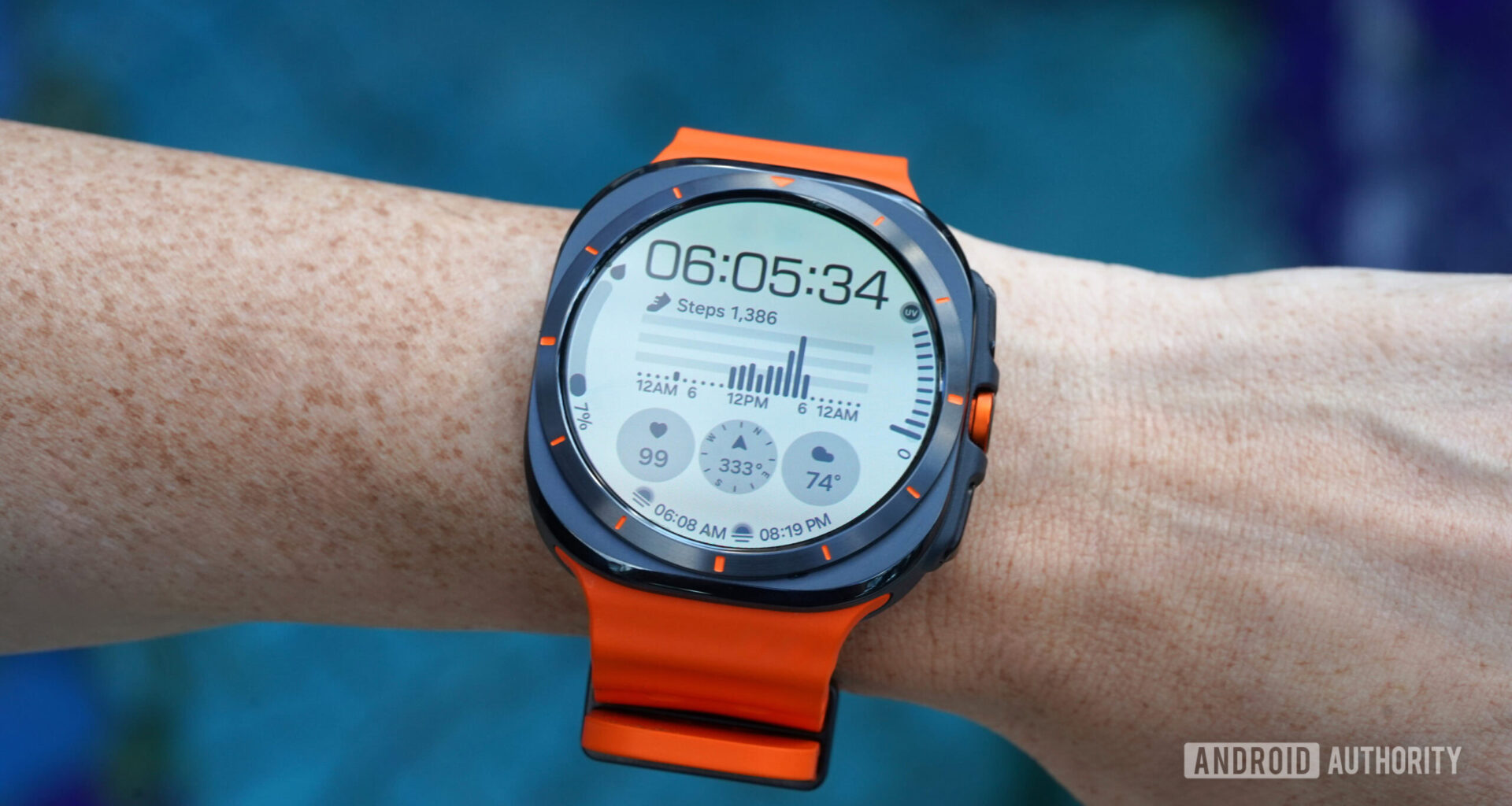 A Samsung Galaxy Watch Ultra displays a native watch face.