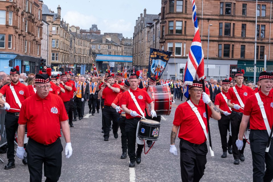 01/07/23...GLASGOW CITY...ORANGE WALK.....ORANGE WALKS FROM ACCROSS SCOTLAND CONVERGED ON GLASGOW GREEN AS THOUSANDS TOOK TO THE STREETS TO MARCH...