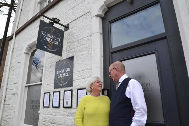 Garry Coutts and his wife, Jane Cumming appear outside of their at their guest house and restaurant