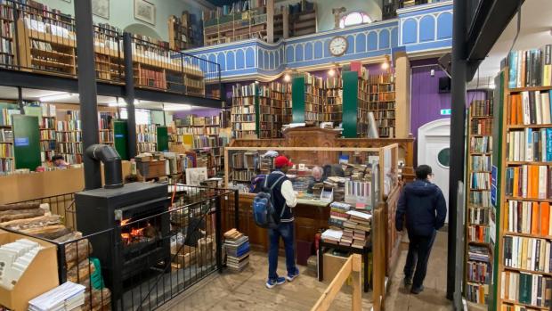 People shop in Leakey's Bookshop