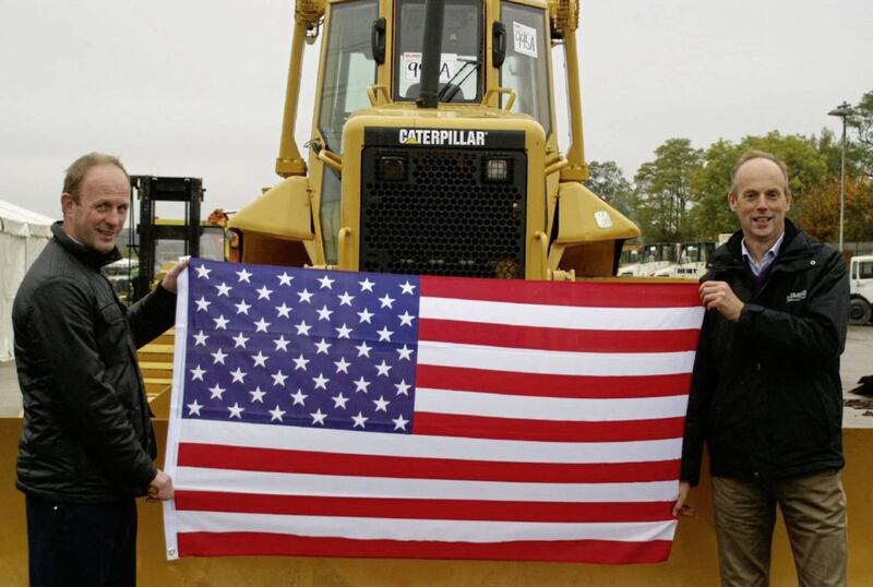 Derek Keys (right) and his brother Jonnie pictured after the merger with US heavy machinery auctioneers Yoder & Frey 