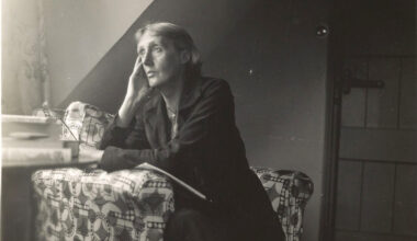 Virginia Woolf at a table