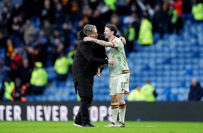 Wimmer and Andy Halliday celebrate victory at Ibrox