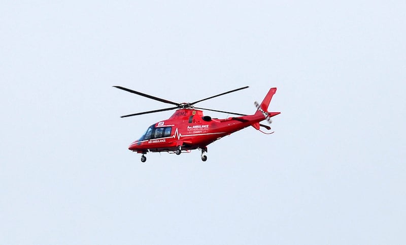 An Air Ambulance over Belfast on Saturday afternoon.
PICTURE COLM LENAGHAN