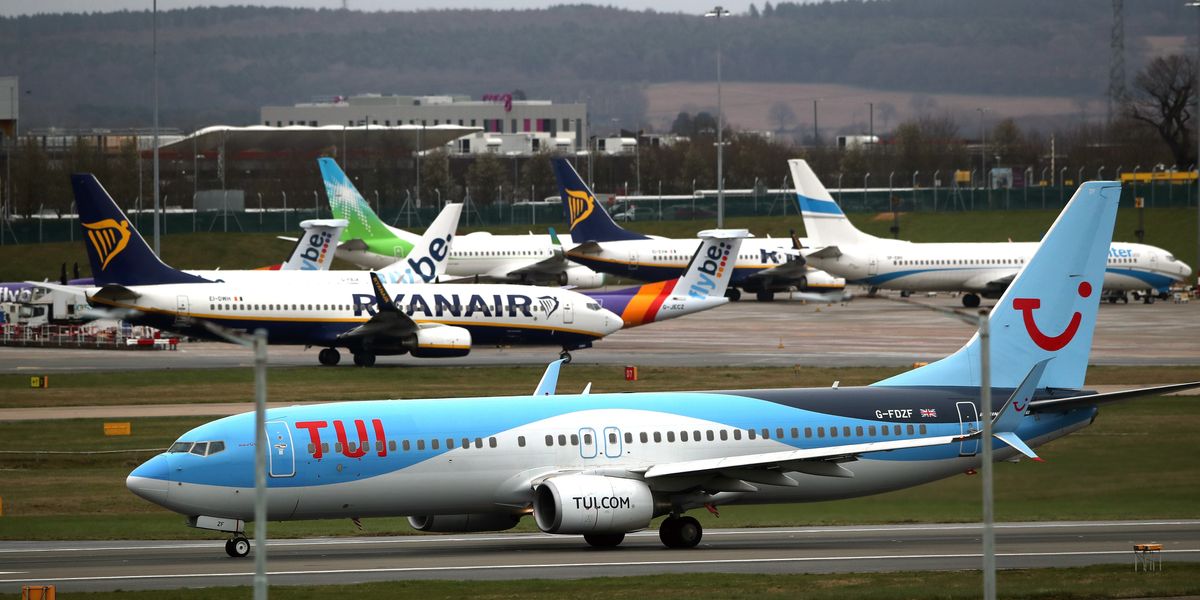 Tui flight erupts into chaos as 'drunk' passenger hauled off after screaming that the 'plane is going to crash' and PUNCHING cabin crew